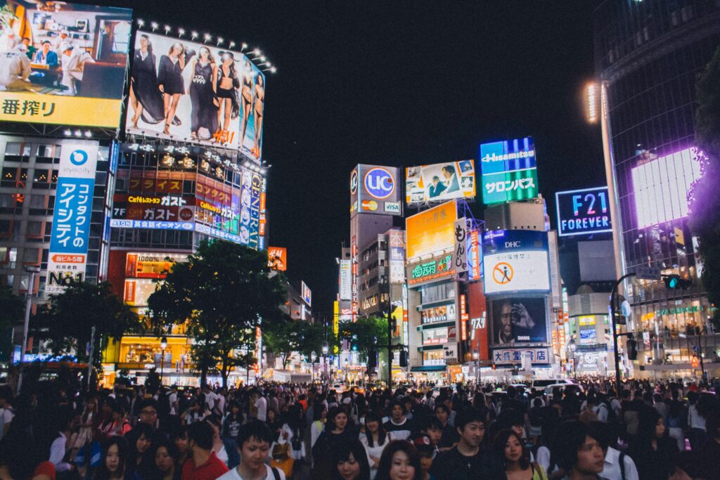 pexels photo 34142 A bustling crowd at Shibuya Crossing under the bright lights of Tokyo's urban night scene.