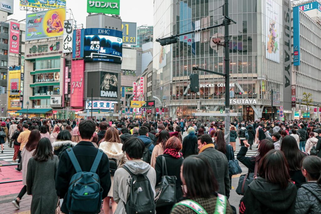 pexels photo 4325988 4325988 Crowd of anonymous people walking on street in downtown of modern Asian city